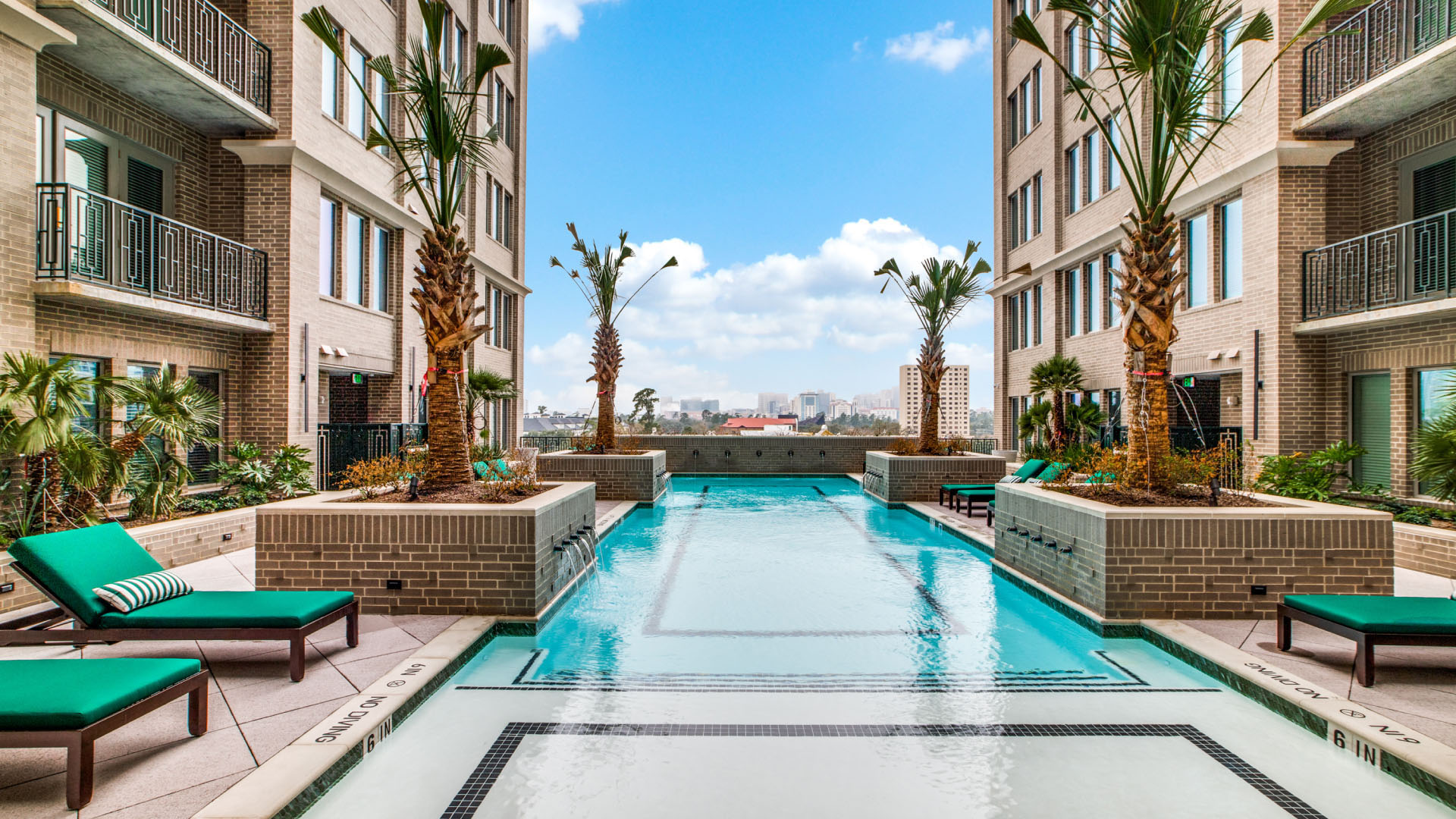 A pool in between multifamily building towers