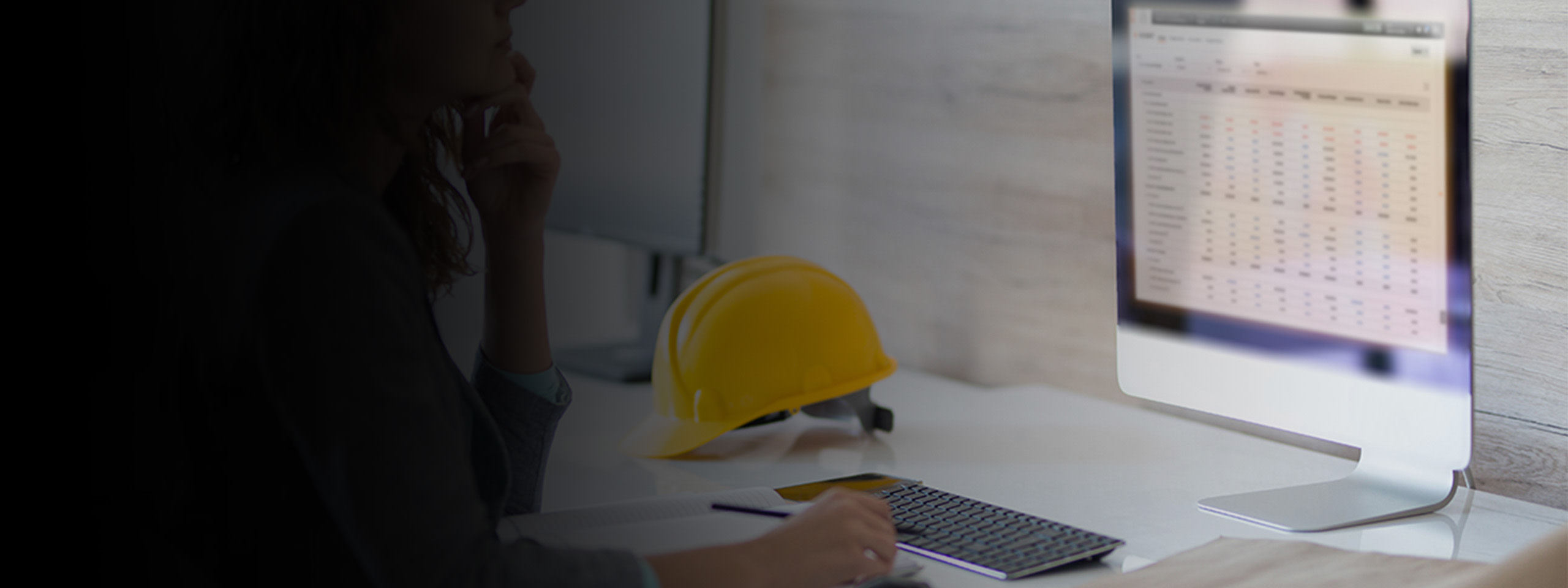 Contractor working on a computer