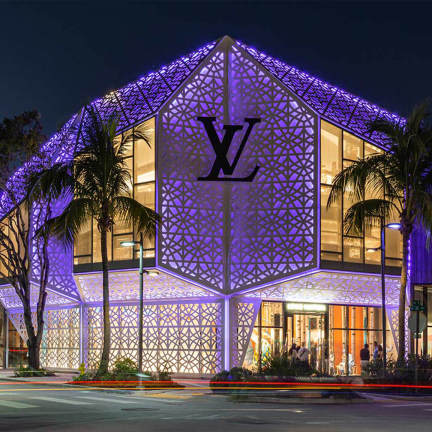 Louis Vuitton store lit up at nighttime