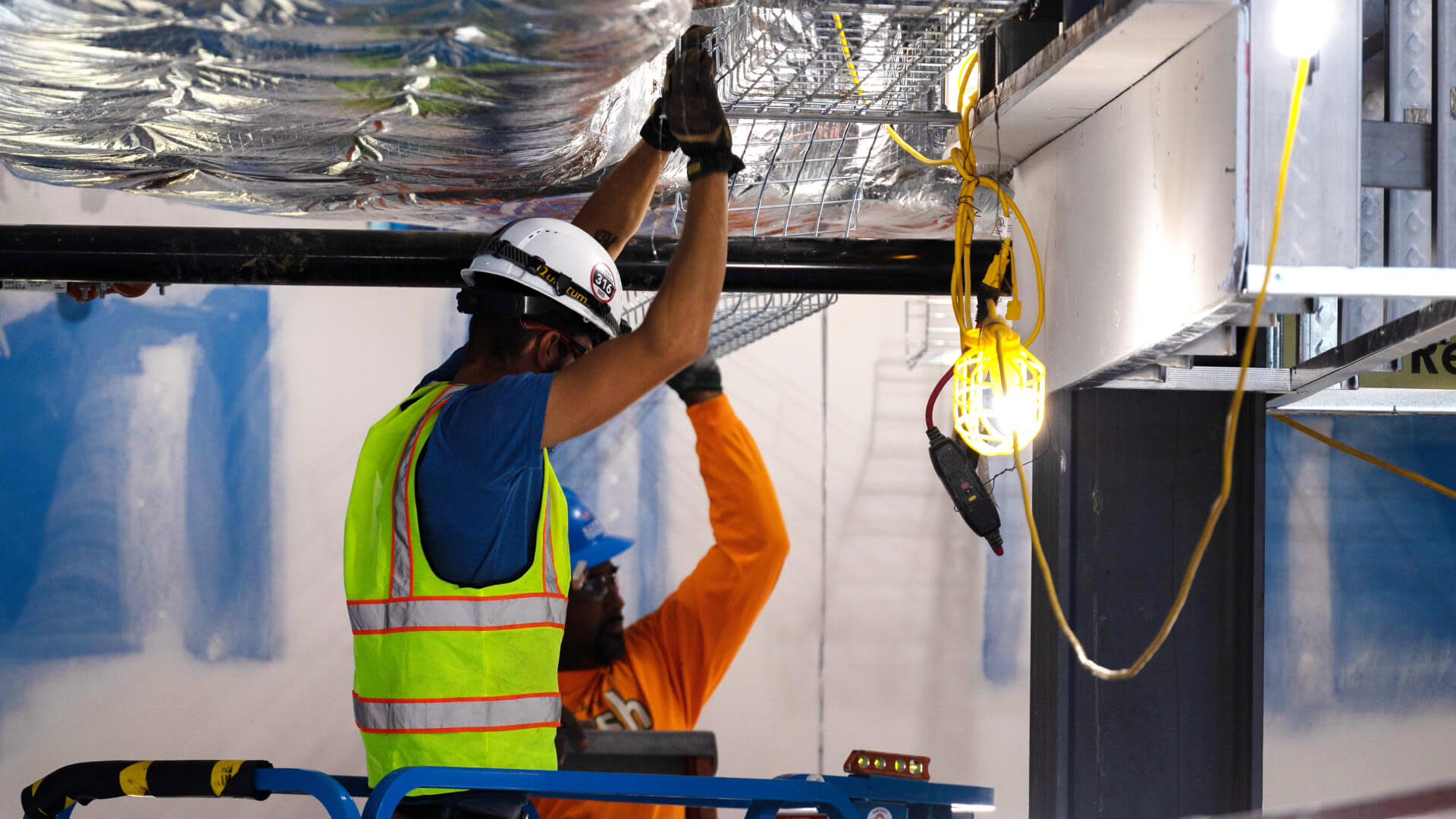 General contractors working on a ceiling