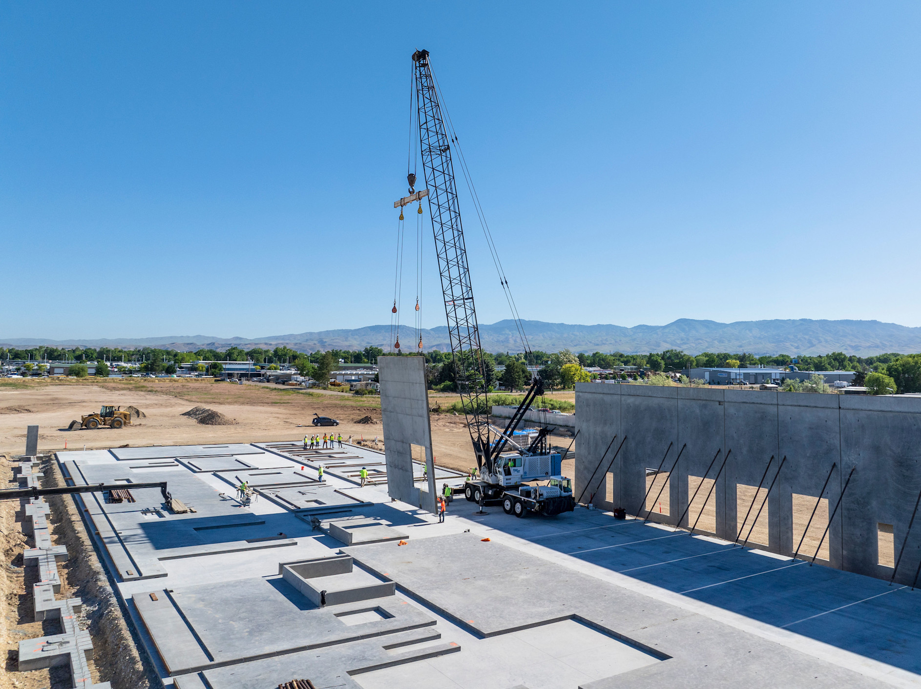 Industrial property build with crane in background