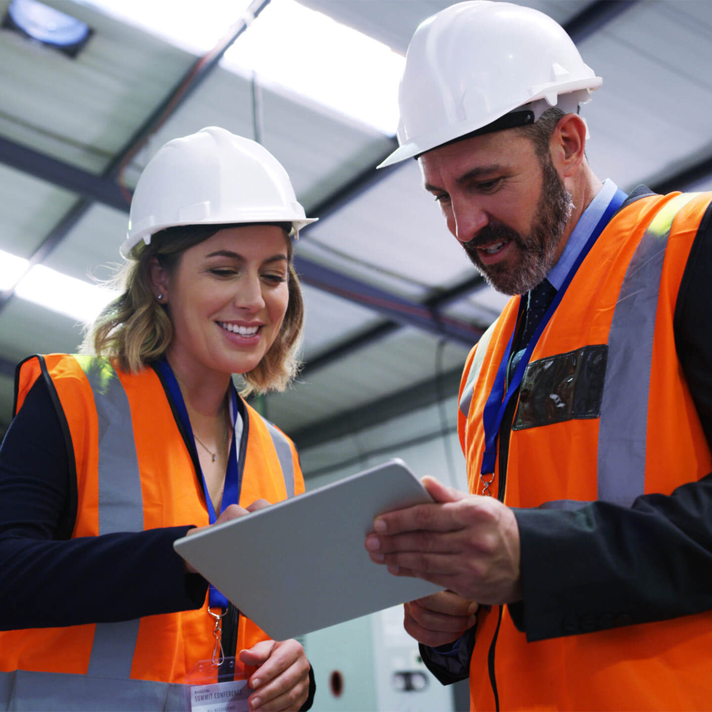 Contractors working with a tablet