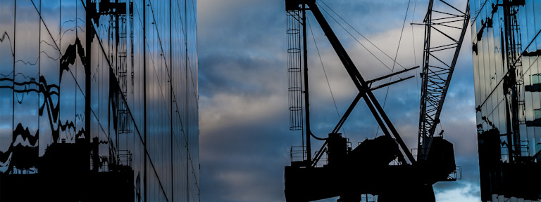 A crane in between two buildings