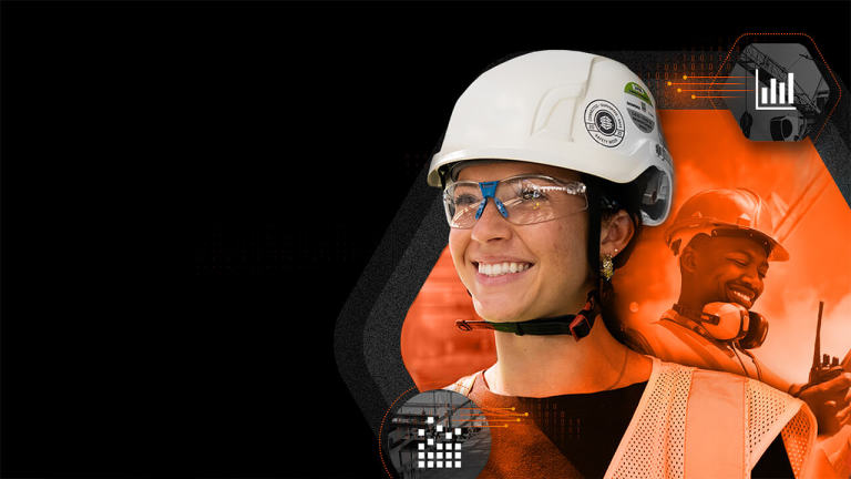 Image of a woman construction worker smiling looking out