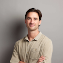 Headshot of Simon Baker