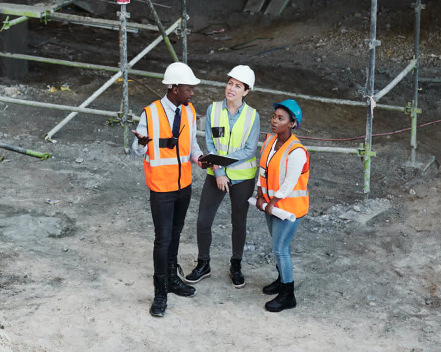 Construction workers inspecting a project