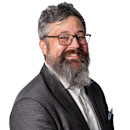 Headshot of Travis Okel