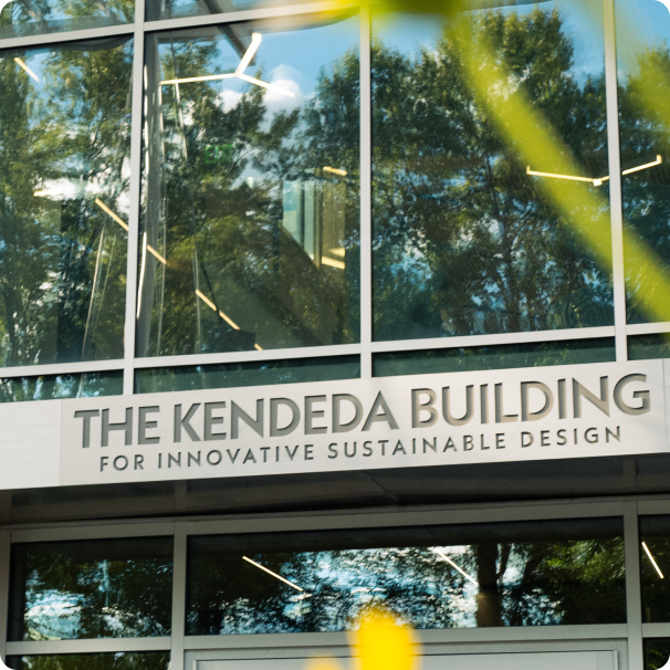 Main entrance of a building with the words "The Kendeda Building" on it
