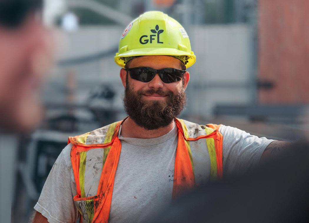Construction worker smiling to the camera