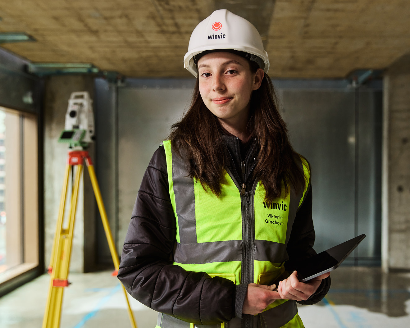 A woman contractor posing for the camera