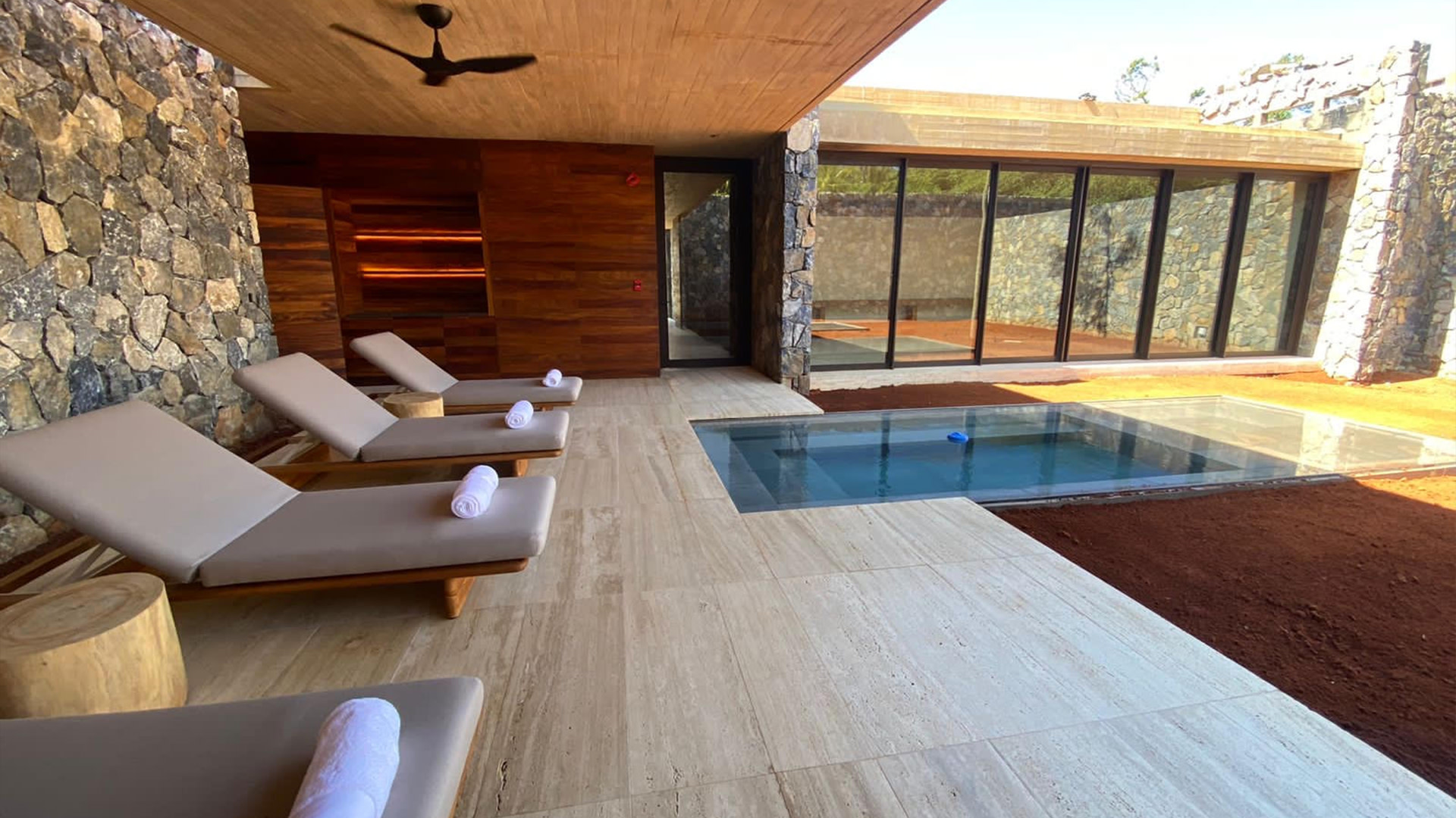 Pool area with lounge chairs