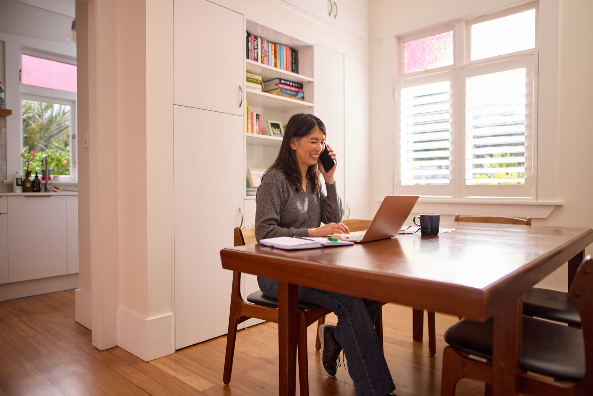 Lady at desk on phone