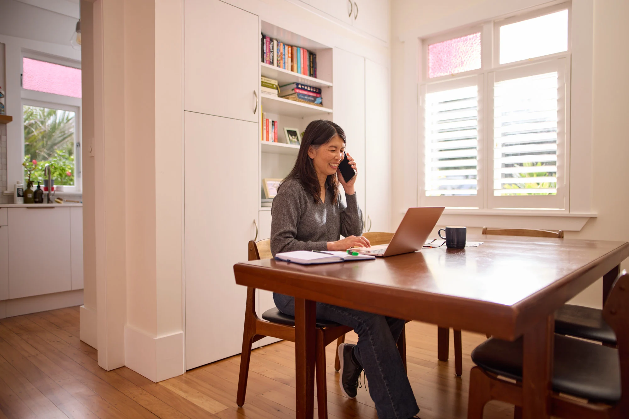 Lady at desk on phone