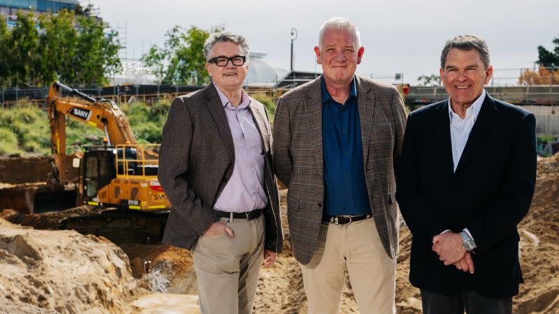 Matthew McNeilly, Jon Stone (centre) and Sirona Urban director Jeff Holloway on-site at Telethon Avenue.