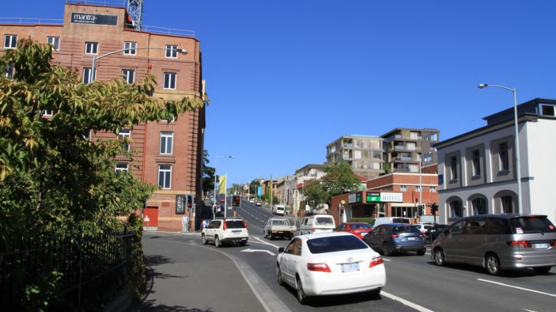 rendering of a tower on Davey street behind the historic buildings. 