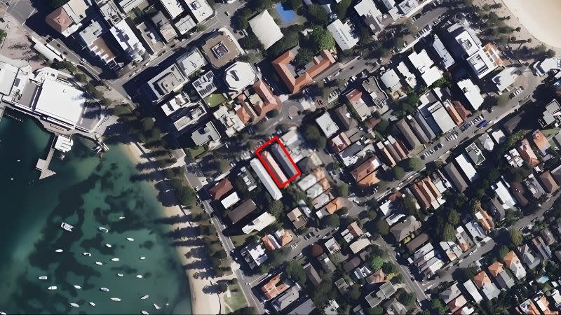 An aerial view of Luxcon Group’s Victoria Parade site between Manly Wharf and Manly Beach.