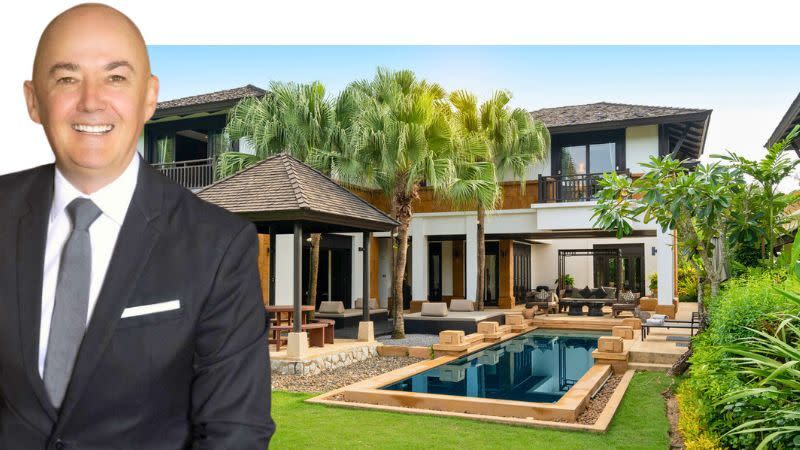 Forsyth Real Estate Agency principal James Snodgrass with a luxury tropical property in the background.