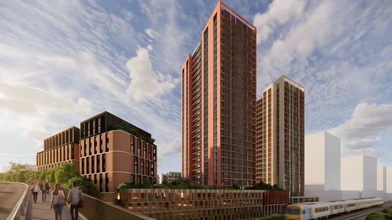 Cox Architecture’s rendering of Keira Place Stage 2, comprising towers of 30 and 25 storeys and a 12-storey co-living building beside the rail corridor.