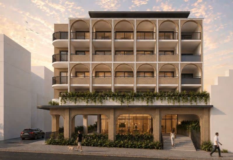A Habitation Design + Interiors rendering of the May Street scheme, with boarding rooms and apartments above ground-floor vehicle sales.