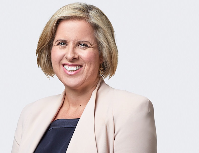 Master Builders Australia chief executive officer Denita Wawn in front of a crane