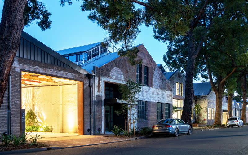 Goodman says it has leasing commitments for 75 per cent of the adaptive re-use of the three heritage-listed warehouses. 