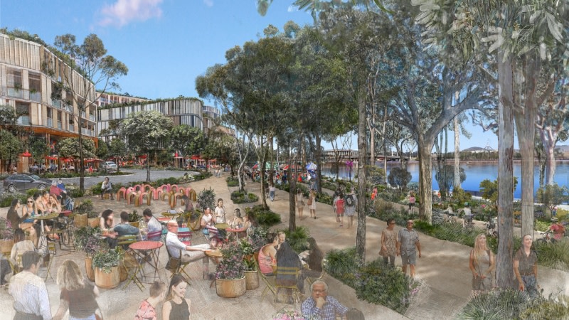 sketch of a waterfront neighbourhood showing a cafe, apartment buildings and a lake 