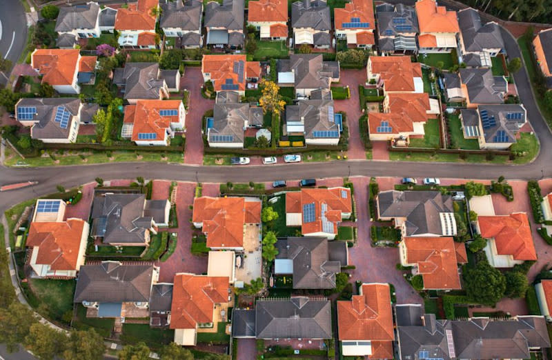 An aerial photo of suburban houses. PropTrack data shows home prices rose this month in most markets.