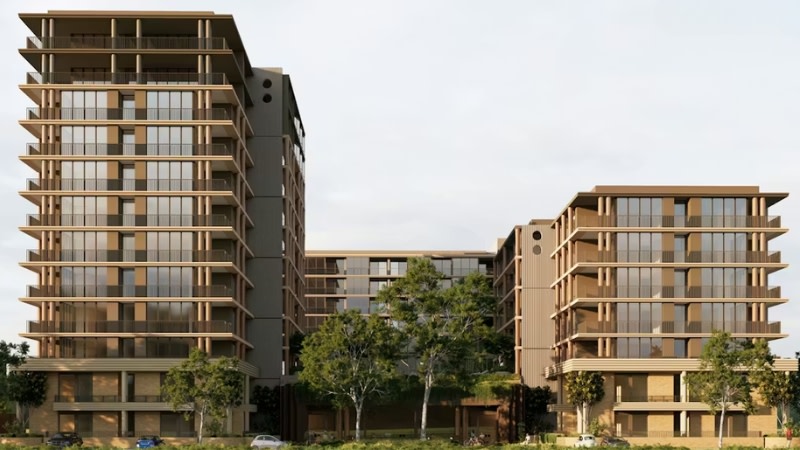 rendering of three buildings with a shared two storey podium with a metallic finish 