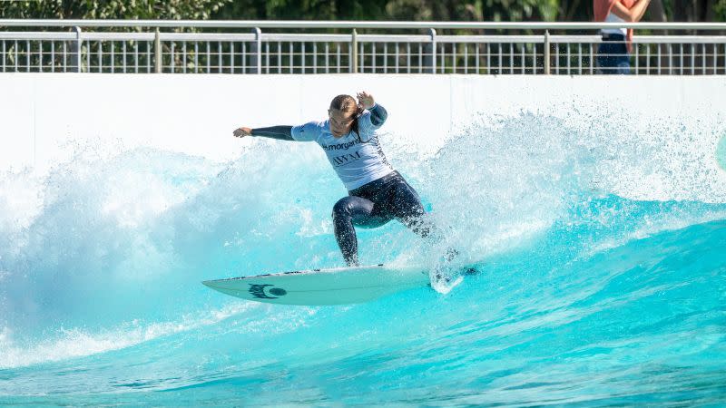 Felicity Palmateer, pictured carving a wave at URBNSURF Sydney during the 10-year anniversary of Wipeout Dementia