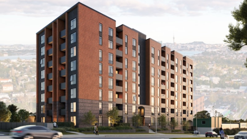 rendering of a multilevel brick build to rent development with auckland cbd on the horizon