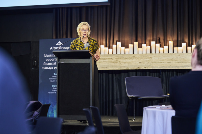 Jo Street from Furn-Niche on stage speaking at a hotel development summit in Sydney.