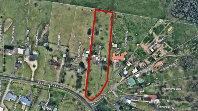 aerial image showing older farm style homes on 2ha blocks in Sydney