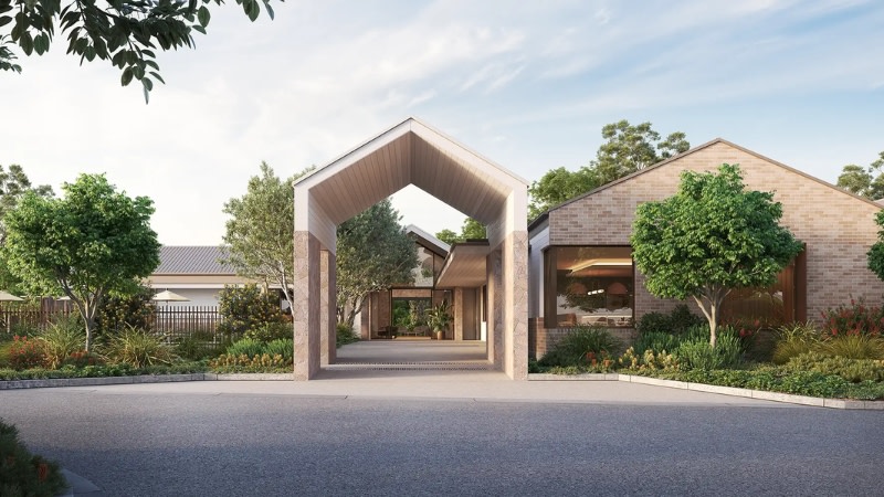 rendering of a large archway entrance to an ammenities area within a land lease development