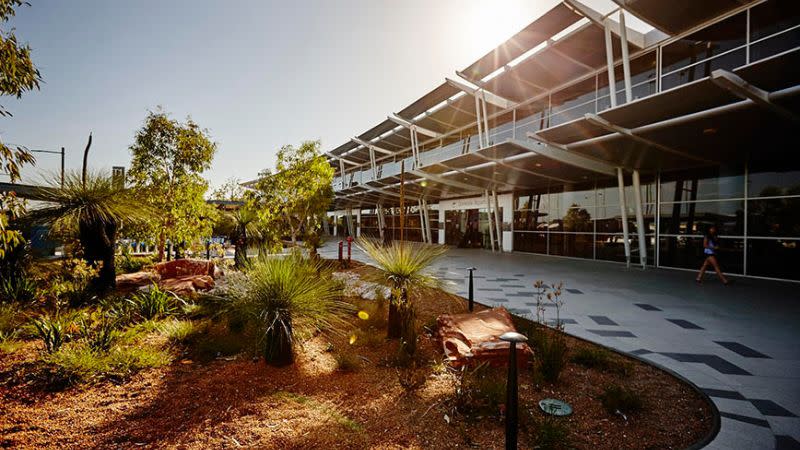 An outdoors photo of Perth Airport's Terminal 1.