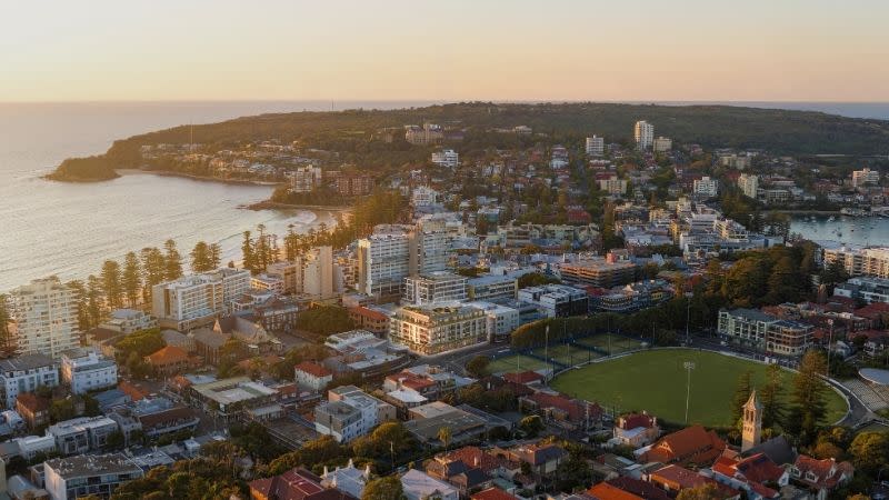 Aerial rendering of Time & Place’s Two Tides development in Manly, overlooking the Northern Beaches coastline.