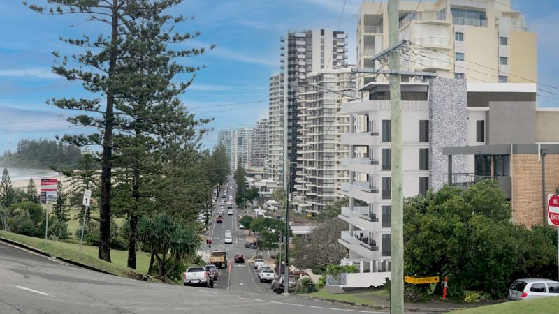 Render of the proposed medium-rise apartment building (right) atop Kirra Hill on the Gold Coast.