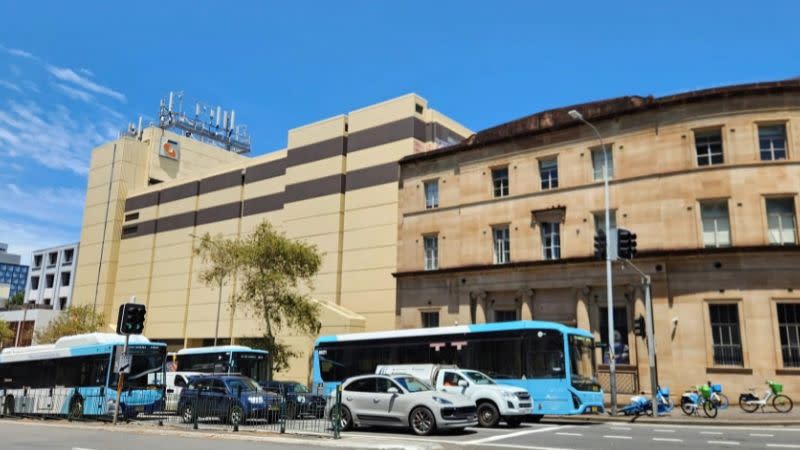The former Telstra exchange at 184-200 Broadway will become a five-storey backpacker hostel.