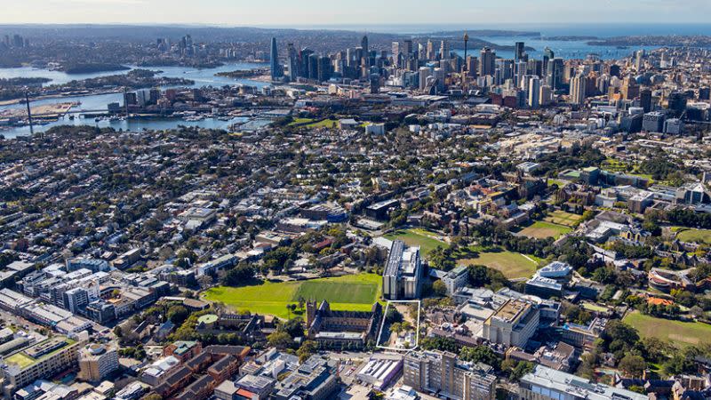 aerial image over the The University of Sydney with a parcel of land next to the hospital and st john's college highlighted.