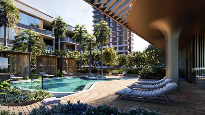 render of a swimming pool and apartment towers in wentworth point with poolside chairs