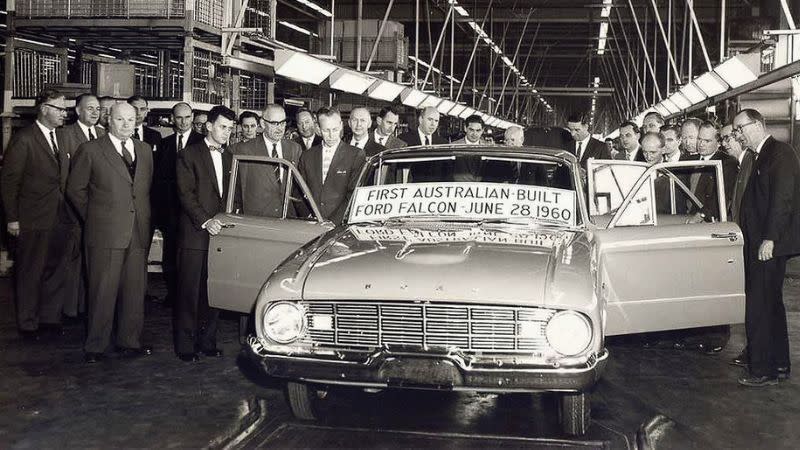 The first Australian Ford Falcon rolls off the assembly line of the Camberfield Ford plant.