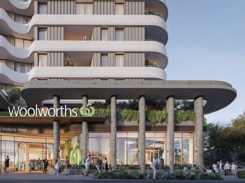 The Woolworths supermarket podium entrance fronts the arterial Victoria Road.