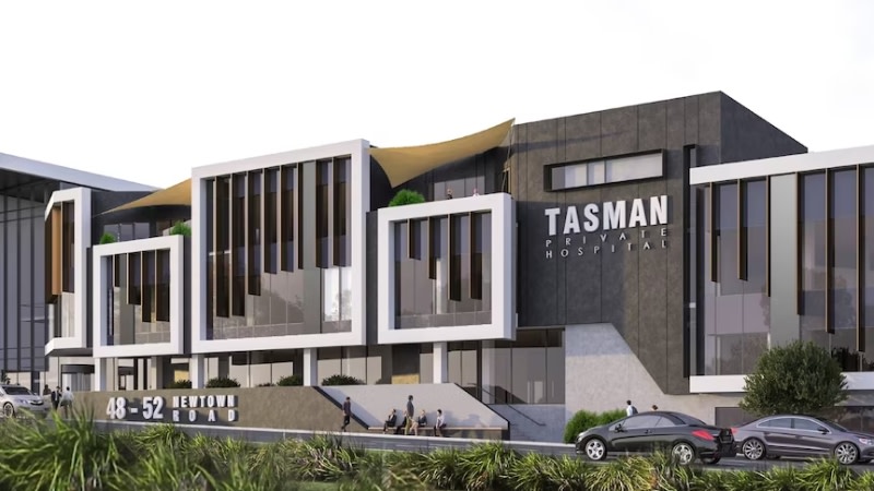rendering of a mid rise black and white private hospital in tasmania