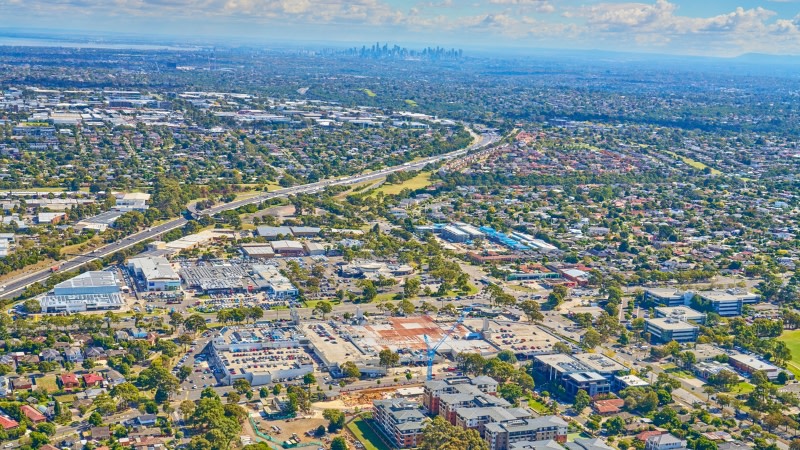 aerial image of the shopping centre in Melbourne's south east with the CBD skyline in the background.