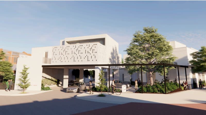 An external rendering of GJJ's planned mixed use project that would rise across the street from Mojo's Bar.