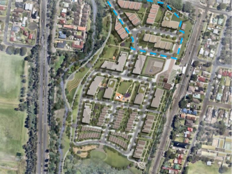 aerial image of a development on the site of the former Corrimal Coke Works. It shows new streets, homes and a creek.