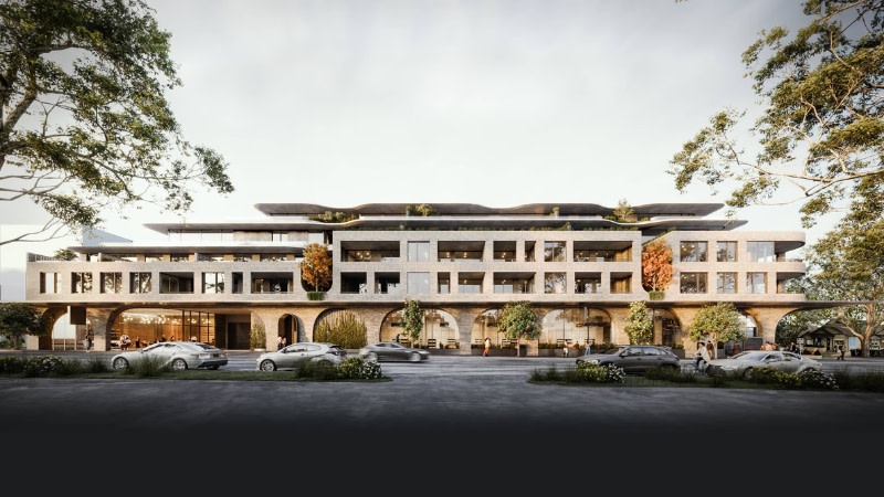 rendering of a large mid-rise mixed-use development in melbourne with arches on the ground floor.