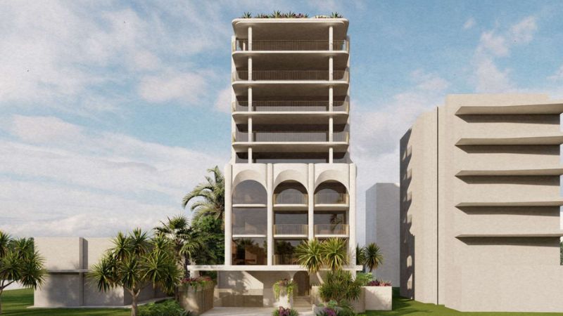Render by Z Architects of a 10 storey tower in the beachside suburb of Bilinga. It has arched windows and is surrounded by palm trees.
