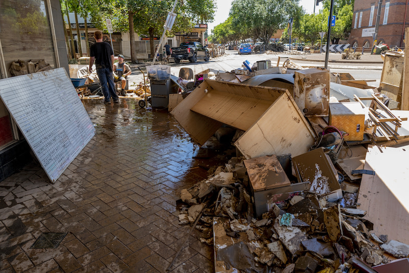 Debris lines the streets of Lismore's CBD after this year's floods, the worst on record.