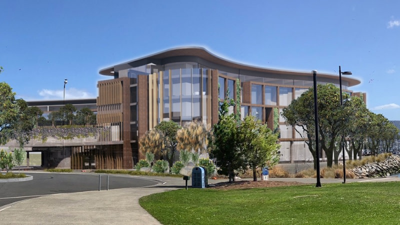 render of the kangaroo bay hotel from the front showing a 5 storey flat development next to the marina