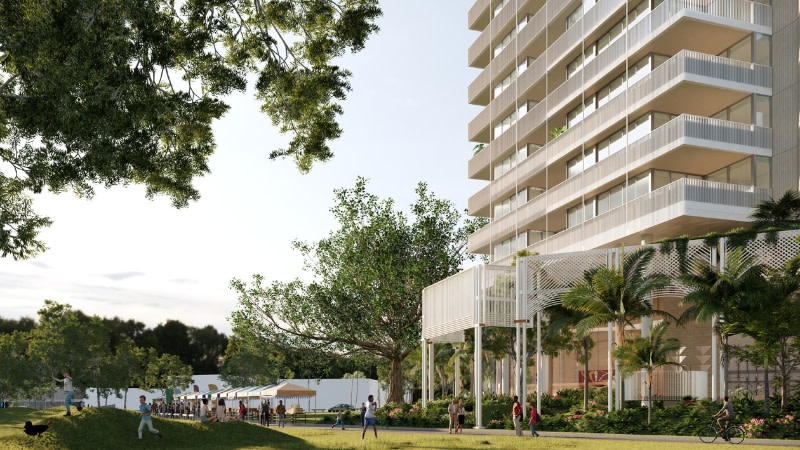 rendering of the lower part of a residential tower showing landscaping and a park